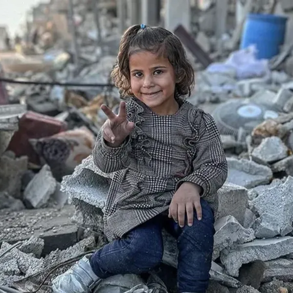 Child smiling in Gaza 3